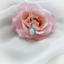 Load image into Gallery viewer, Oval Starburst Keepsake Necklace
